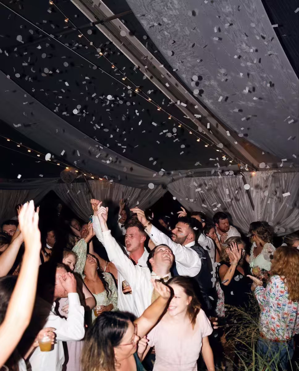 Late-night wedding after-party with candid guest photos
